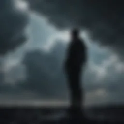 Silhouette of person standing under dark cloud