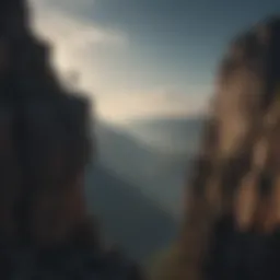 Silhouette of a person standing alone on a cliff